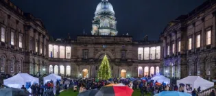 Staff and students gather at the Old College Quadrangle for the official lighting of the Christmas Tree