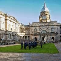 Cadets from the forces line up in the Old College Quadrangle 