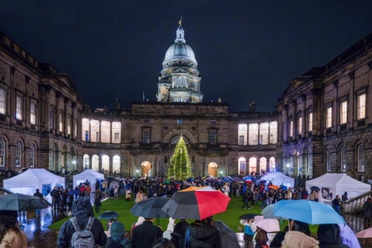 Staff and students gather at the Old College Quadrangle for the official lighting of the Christmas Tree