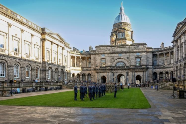 Cadets from the forces line up in the Old College Quadrangle 